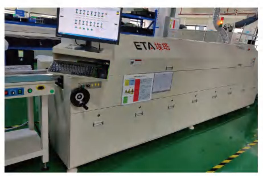 SMT line 3 — ETA reflow oven with end-of-line process monitor